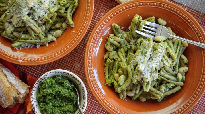 a bowl of white bean pesto pasta