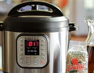 an instant pot next to a package of camellia beans