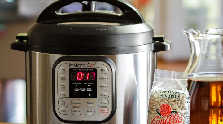 an instant pot next to a package of camellia beans