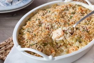 a pan of creamy green lima bean and shrimp casserole