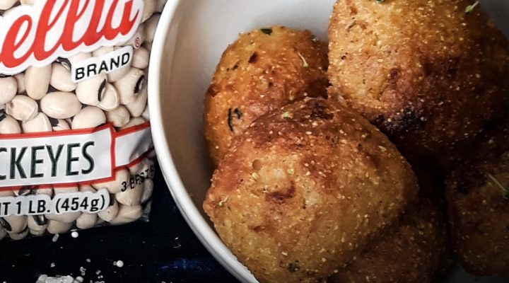 a bowl of black eye pea fritters next to a package of camellia brand black eyes