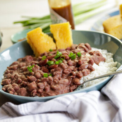 Plated red beans and rice dish with cornbread on the side.