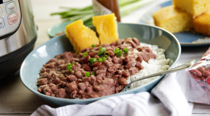 Plated red beans and rice dish with cornbread on the side.