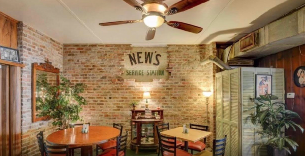 The original gas station signage is still visible in the restaurant's dining room.