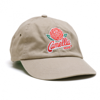 a brown duck billed baseball cap with a red camellia brand flower logo on the front
