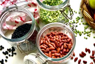 3 jars storing camellia branded beans getting filled