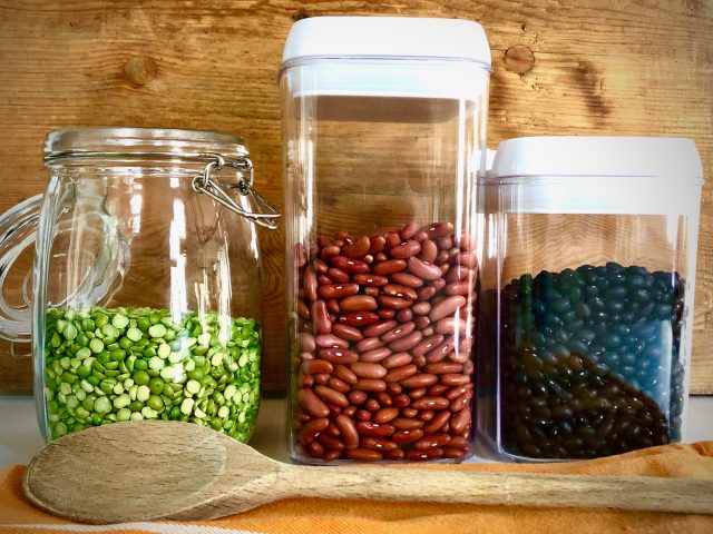 Dried lima beans, red beans and black beans in sealed jars