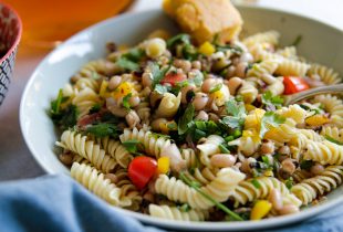 a bowl of cowboy caviar pasta