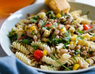 a bowl of cowboy caviar pasta