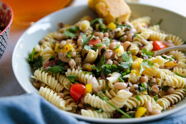 a bowl of cowboy caviar pasta