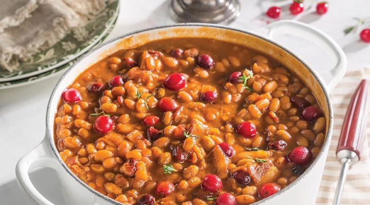 a dutch oven of cranberry bbq baked beans