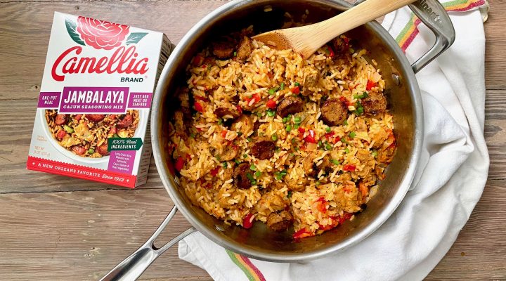 Pot of Vegan Jambalaya with Camellia Brand's Jambalaya Seasoning Mix next to it