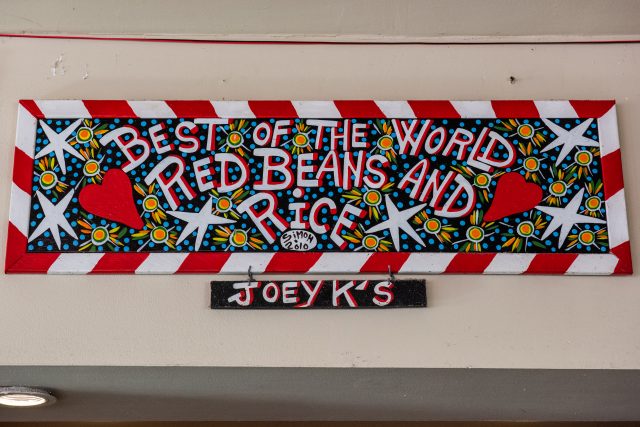 Sign reading Best of the World Red Beans and Rice - Joey K's