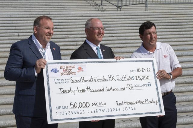 Vince Hayward, left, CEO of L.H. Hayward &amp; Company, Gov. John Bel Edwards and Robbie Trahan, co-owner of Crowley's Falcon Rice Mill and producer of Cajun Country Rice. The 'Red Beans & Rice Mondays' campaign benefitted the Greater Baton Rouge Food Bank and Second Harvest Food Bank, helping provide 50,000 meals in the Fall of 2022.