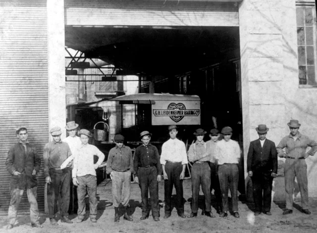 an old black and white picture of some of the first employees at leindenheimer baking co