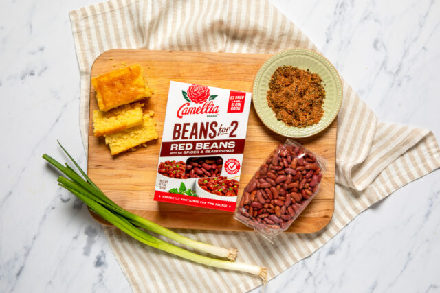 Red Beans for 2 box, next to corn bread and green onion