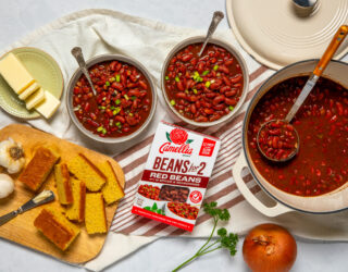 Beans for 2 Box, next to pot of cooked beans and two bowls of beans