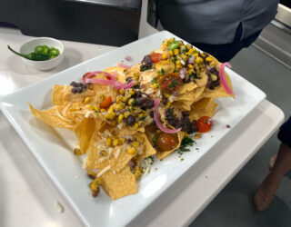 rectangular plate of Jamaican Jerk Black Bean Nachos