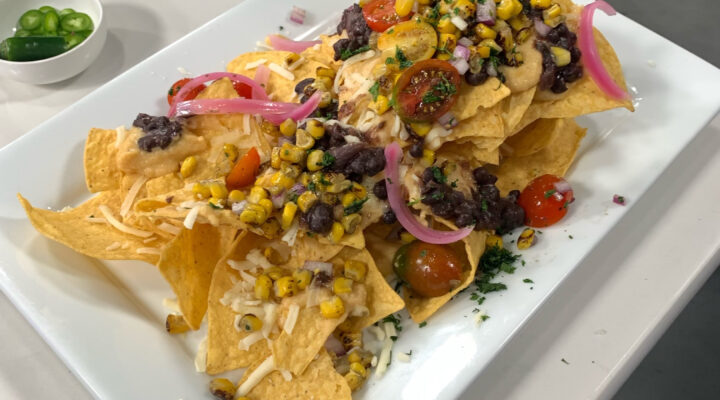 plate of Chef Jamie nachos with white bean cheese