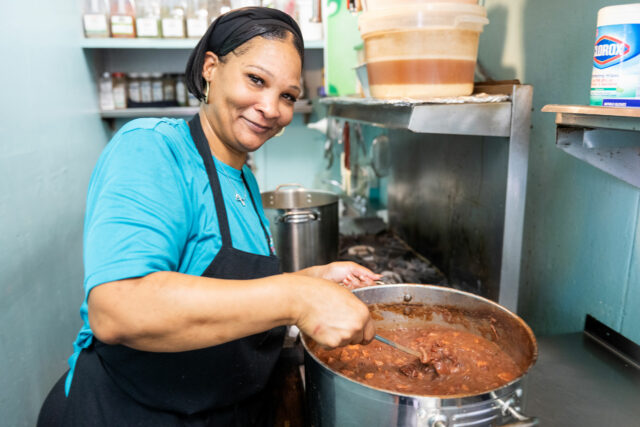 chef cooking red beans in the restaurant kitchen 